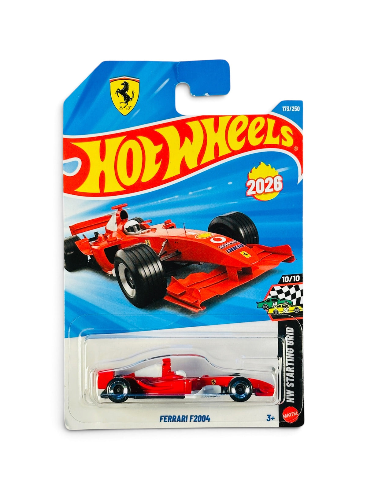 Hot Wheels Ferrari F2004 red Formula-style die-cast racing car in original blister packaging.