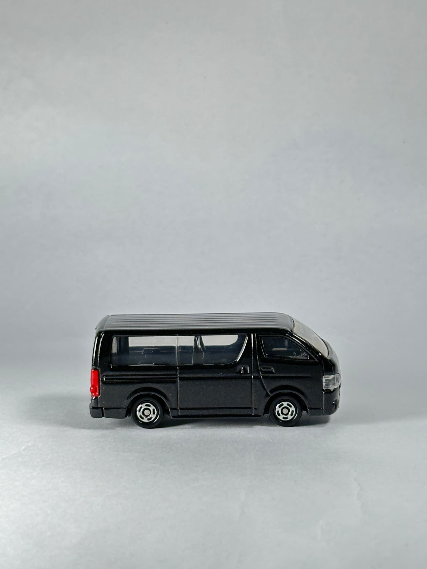 Tomica Toyota Hiace black collectible van with realistic detailing