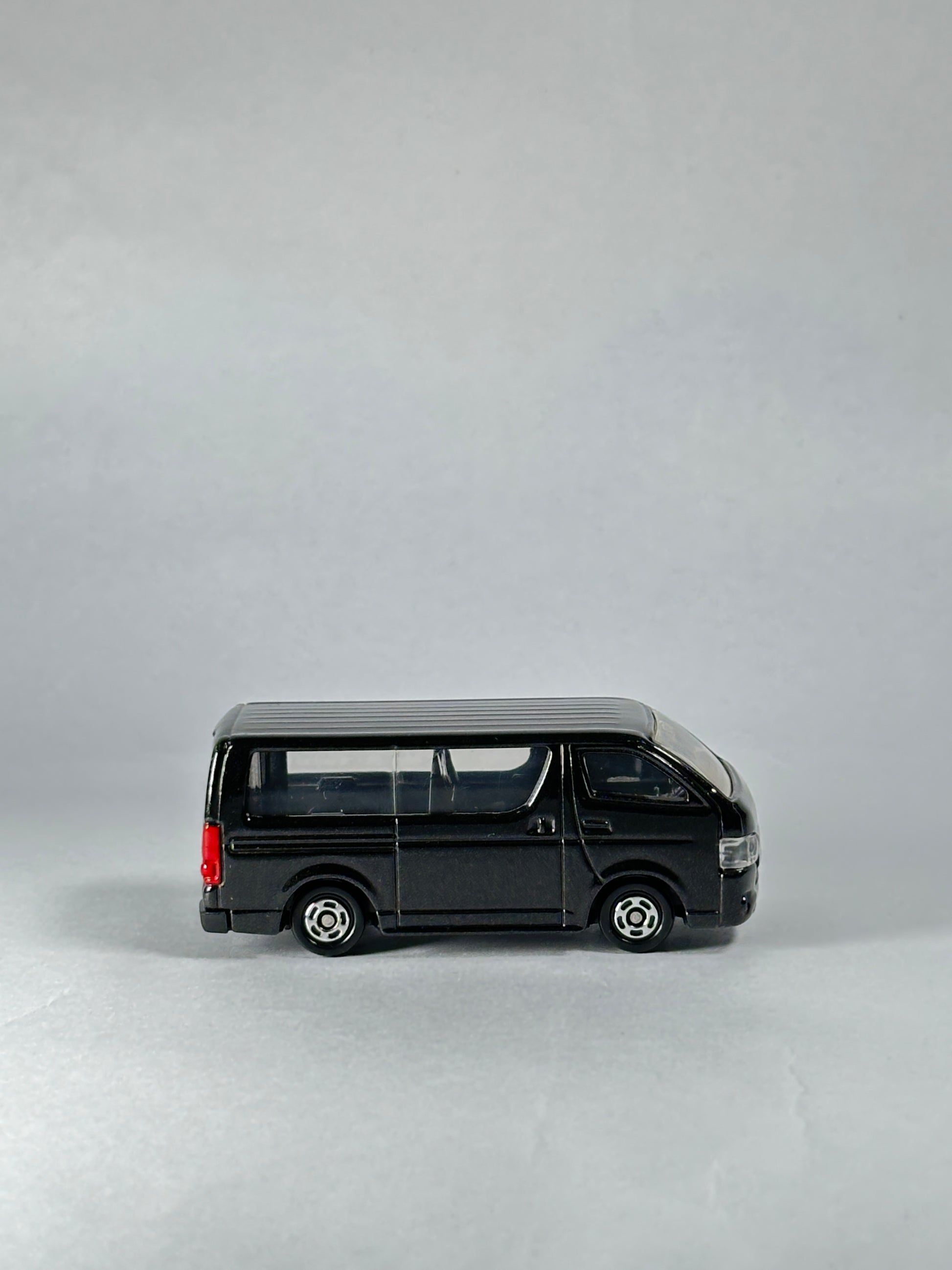 Tomica Toyota Hiace black collectible van with realistic detailing