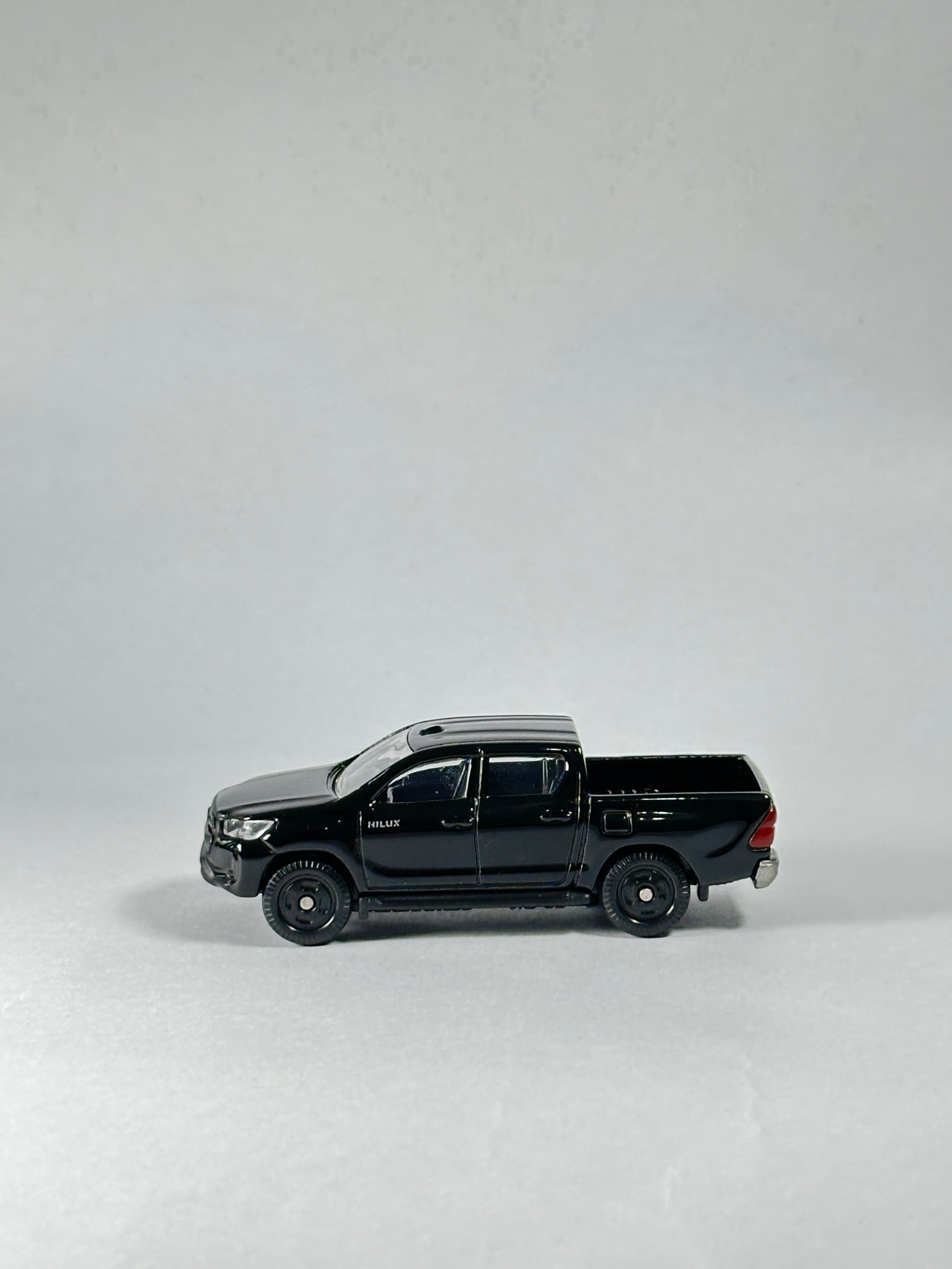 Toyota Hilux 1/70 scale diecast pickup truck with realistic detailing