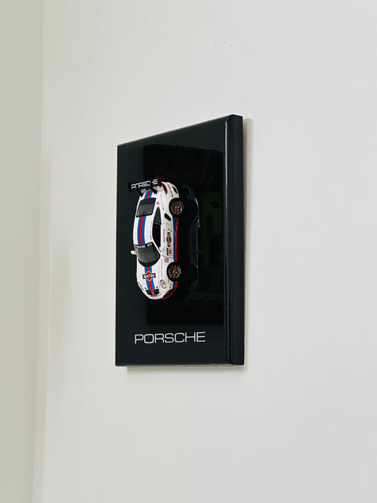Porsche 911 racing car resin model mounted on black display frame