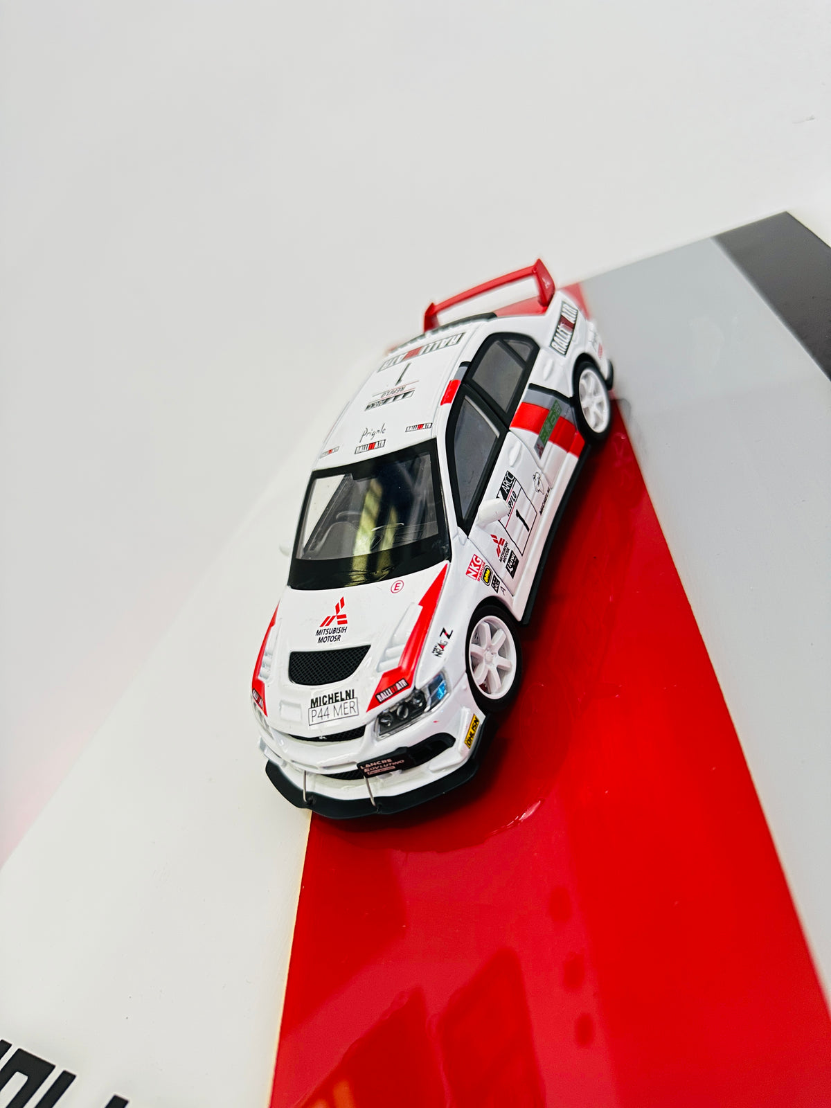 Mitsubishi Evolution rally model car framed display