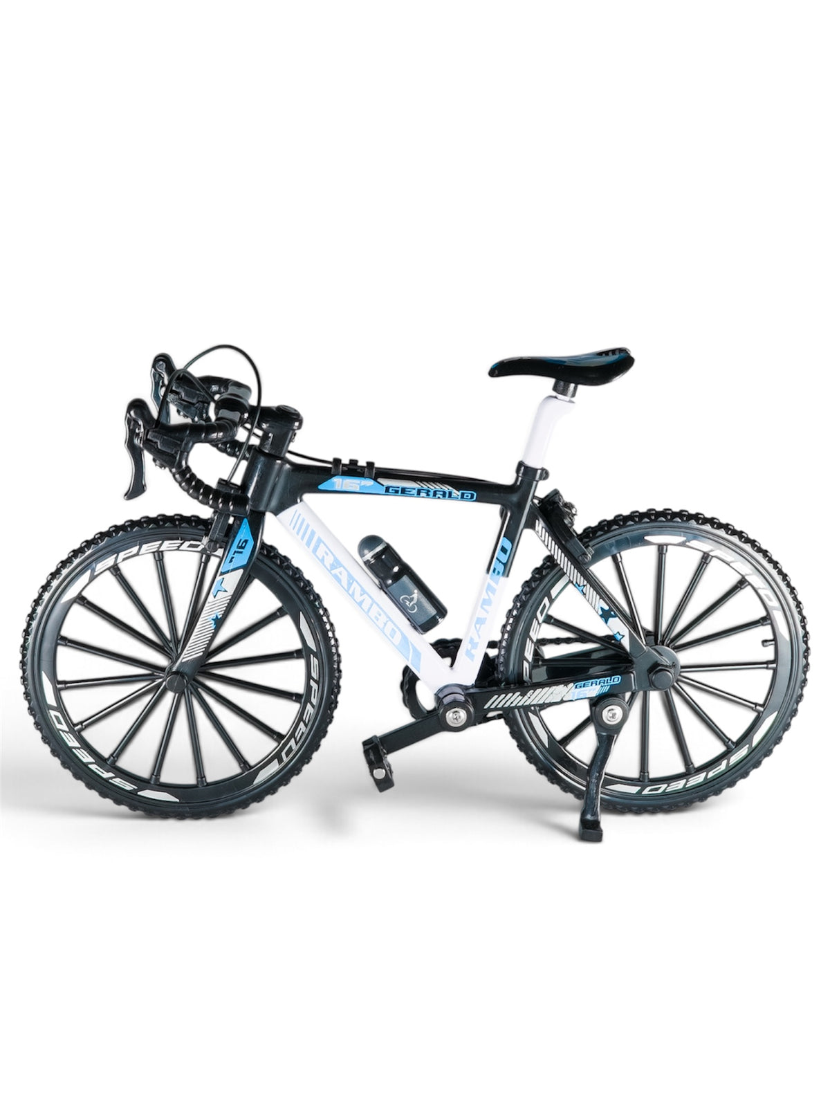 Miniature black and white road racing bicycle model displayed on a studio background.