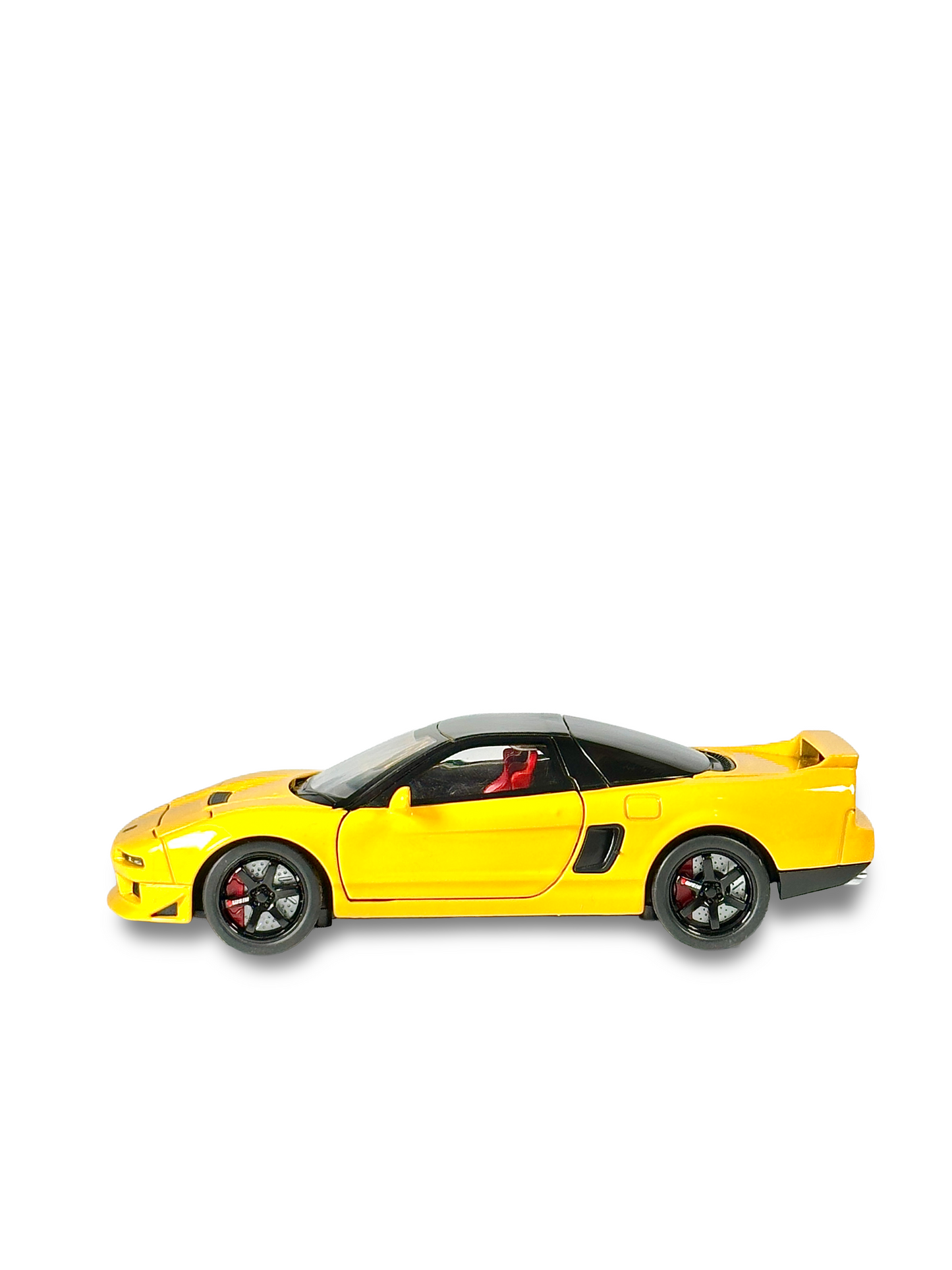 Detailed Honda NSX-R yellow model car with black roof and red cabin