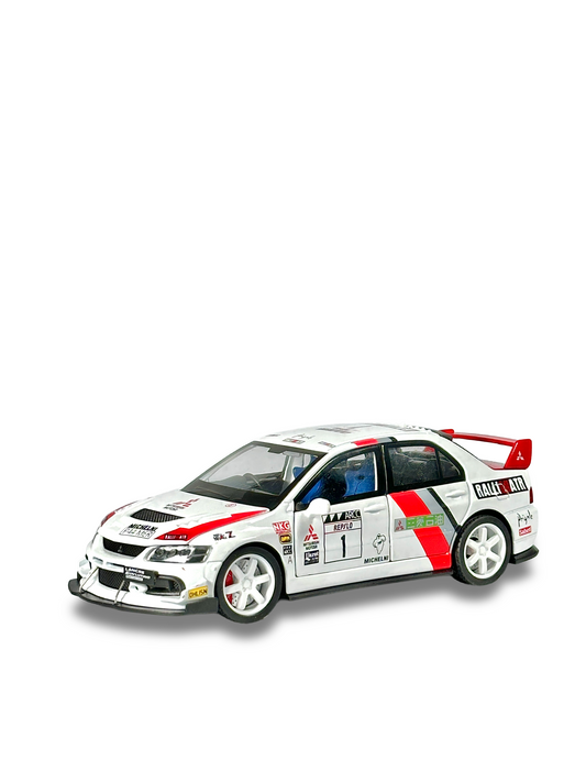 White Mitsubishi Evo IX rally diecast model featuring racing decals and detailed interior